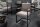 Freischwinger Stuhl Taupe Schwarz Stoff Metall mit Armlehne